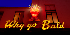 Universal Clinic's famous 'Why Go Bald' Neon Sign